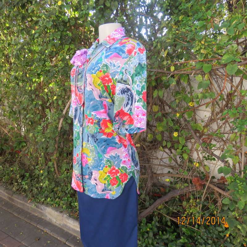 Colouful floral button down top with collar/rounded hems/short sleeves. Size 34 by CONCEPTS.As new