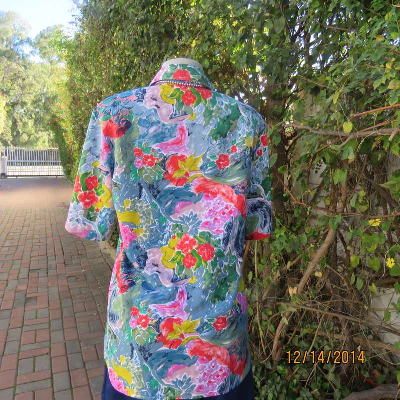 Colouful floral button down top with collar/rounded hems/short sleeves. Size 34 by CONCEPTS.As new