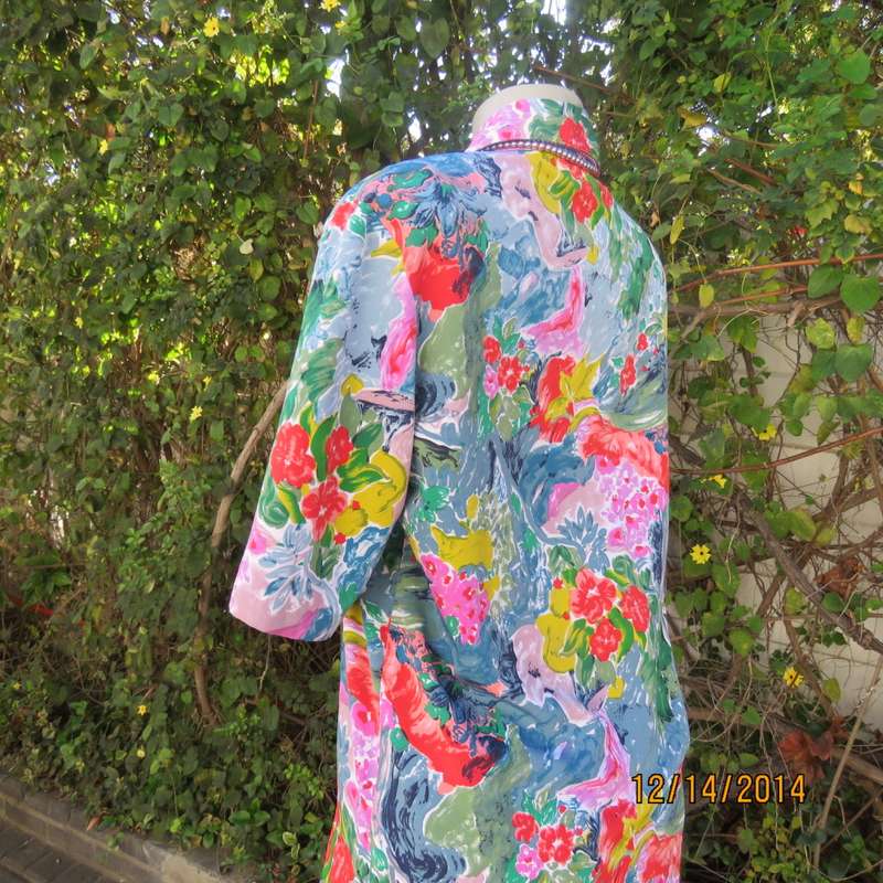 Colouful floral button down top with collar/rounded hems/short sleeves. Size 34 by CONCEPTS.As new