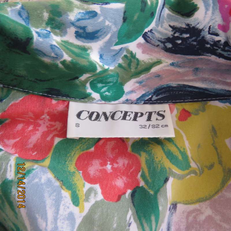 Colouful floral button down top with collar/rounded hems/short sleeves. Size 34 by CONCEPTS.As new