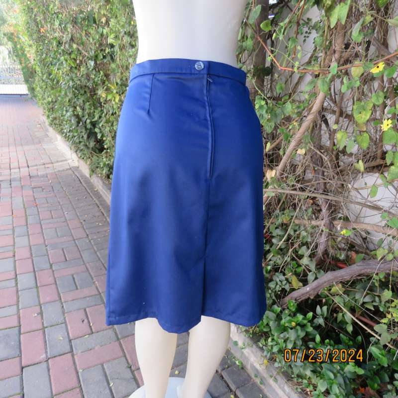 Handy cobalt blue polycotton pencil skirt with zip and pleat at back. Size 40. Very good cond.