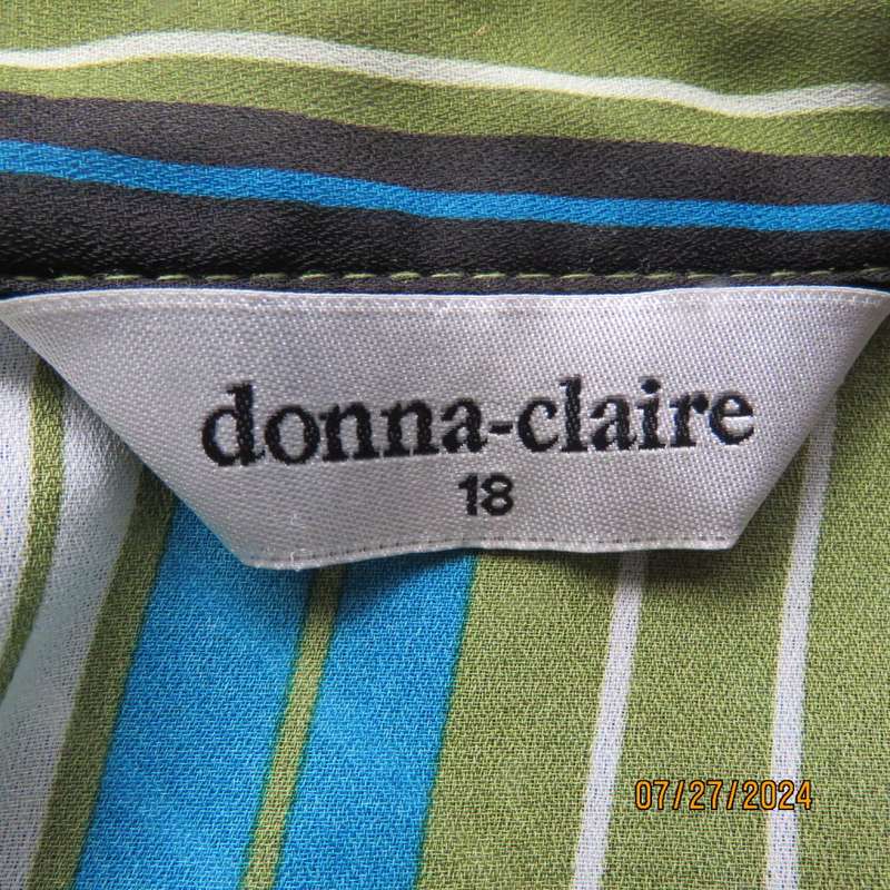 Fabulous DONNA CLAIRE size 42 blue/green/mustard/black vertical striped polyester top. Brand new con