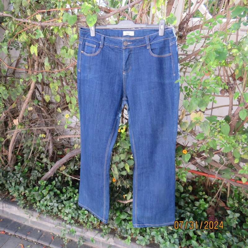 PENNY C size 42 blue denim jeans. Pockets back/front.Bootcut. Some discolouring.Used but in good con