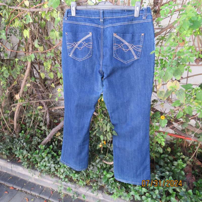 PENNY C size 42 blue denim jeans. Pockets back/front.Bootcut. Some discolouring.Used but in good con