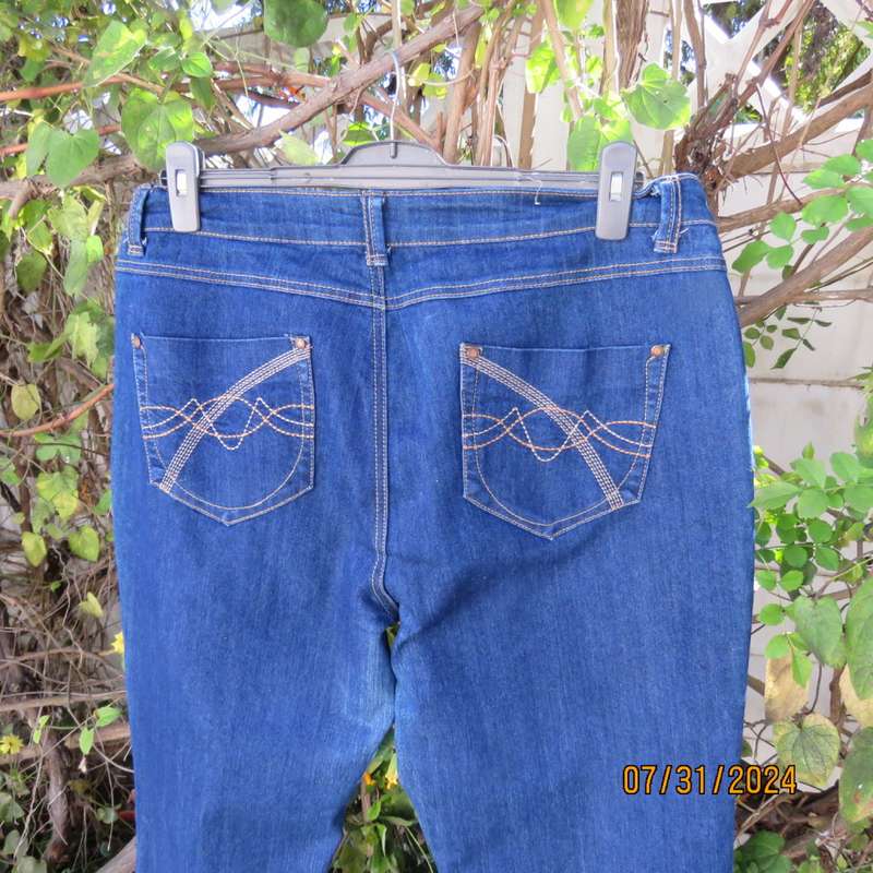 PENNY C size 42 blue denim jeans. Pockets back/front.Bootcut. Some discolouring.Used but in good con