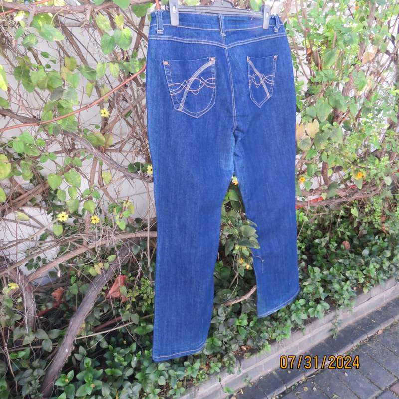 PENNY C size 42 blue denim jeans. Pockets back/front.Bootcut. Some discolouring.Used but in good con