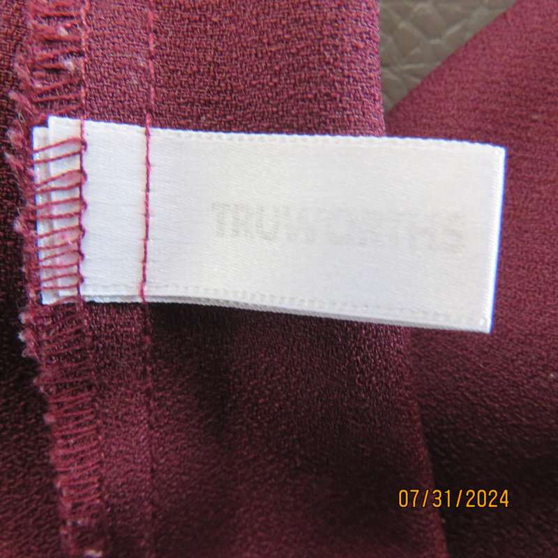 As new ladies trousers in plum polyester by TRUWORTHS size 36/12. Tapered legs. Elastic waist back.
