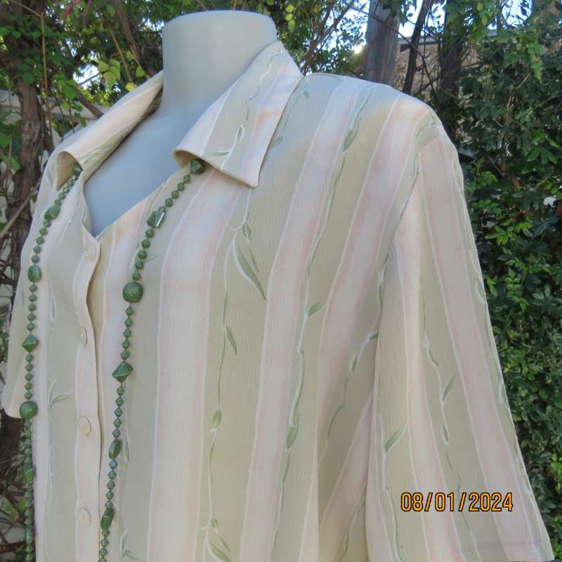 Elegant button down open V and collar top. Peach/green/cream pattern stripes. Size 42. New condition