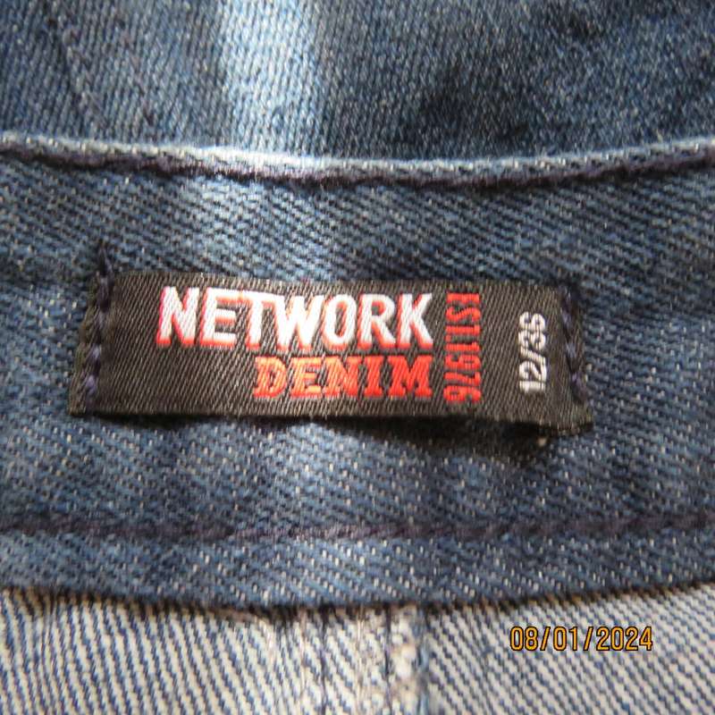 Button down blue jean knee length skirt in polycotton denim. Size 36. Front pockets. As new