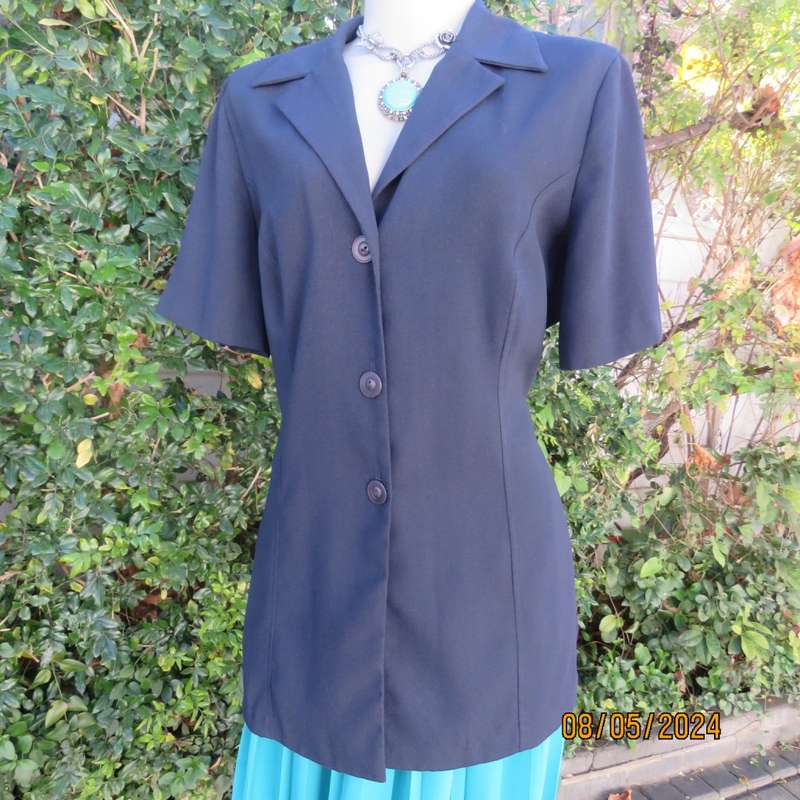 Classic navy button down princess cut short sleeve jacket. Notched collar.Size 38 by TOPICS.