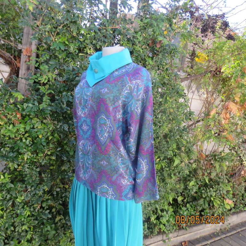 Unique vintage slip over paisley pattern long sleeve top/cross over turquoise collar. Size 35  CHESS