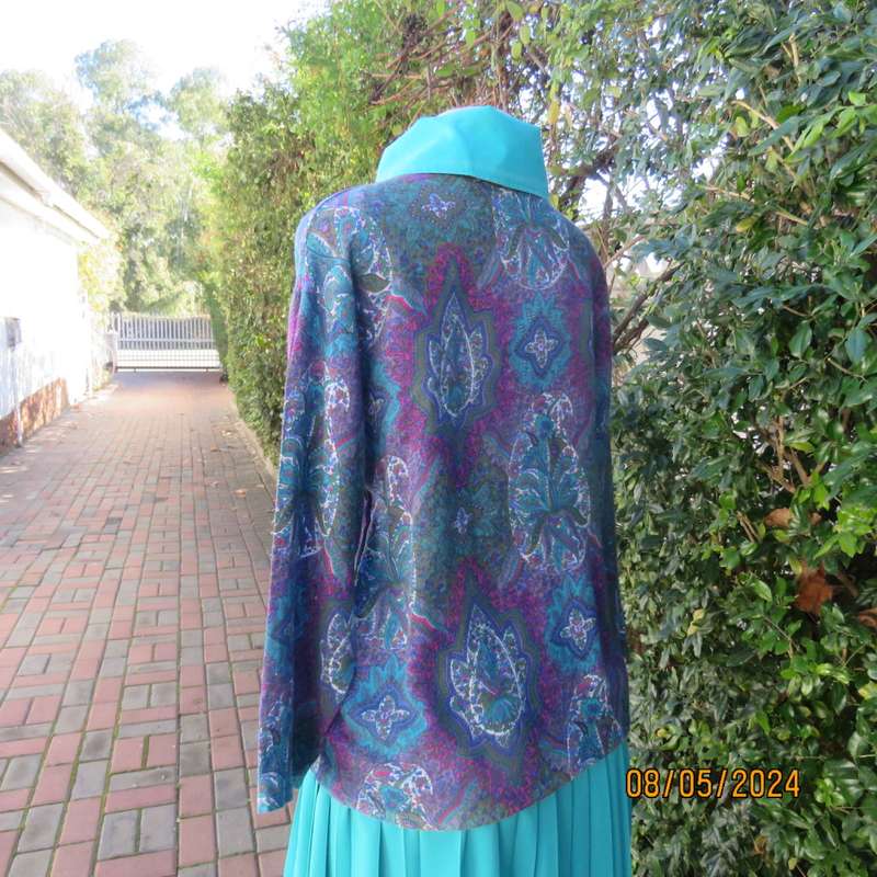 Unique vintage slip over paisley pattern long sleeve top/cross over turquoise collar. Size 35  CHESS