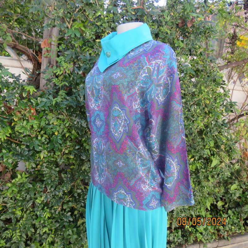Unique vintage slip over paisley pattern long sleeve top/cross over turquoise collar. Size 35  CHESS