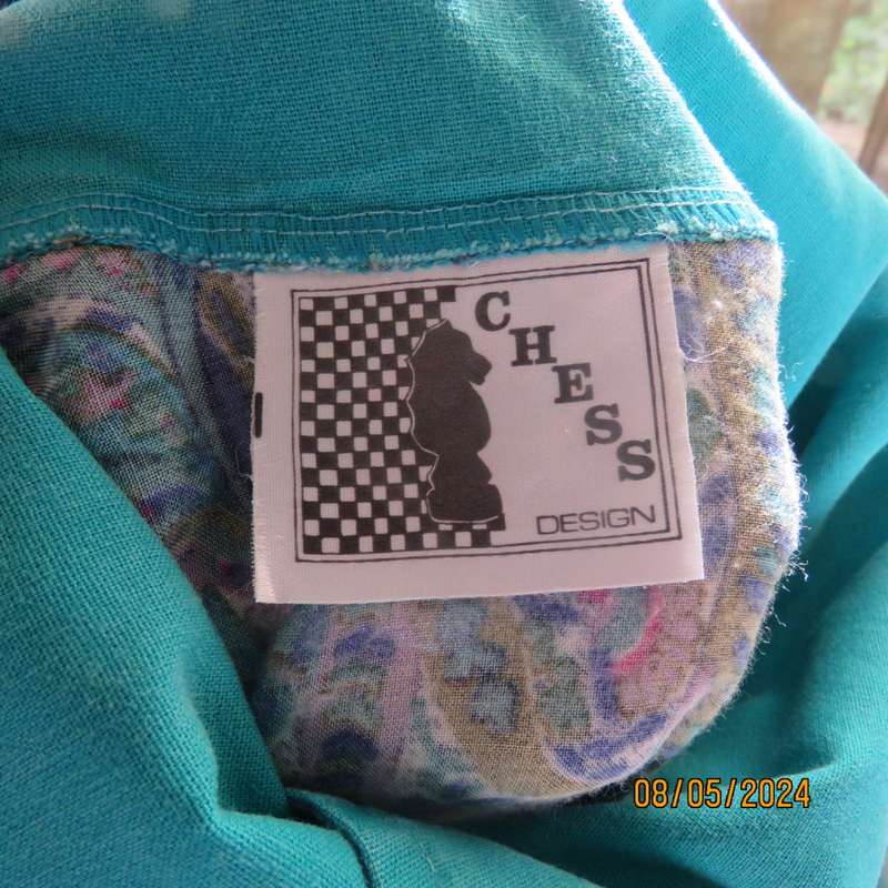 Unique vintage slip over paisley pattern long sleeve top/cross over turquoise collar. Size 35  CHESS