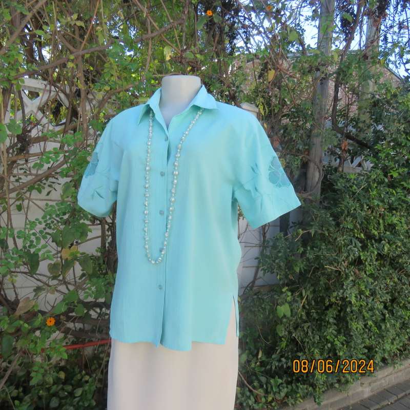 Mint green corded cotton short sleeve button down top by JADORE size 36. Opaque emb. sleeve flowers