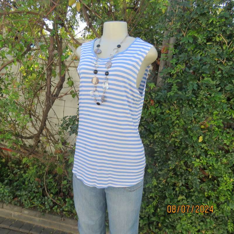 Cool sleeveless horizontal striped blue/white longer length poly/viscose top. Size 36. Good cond.