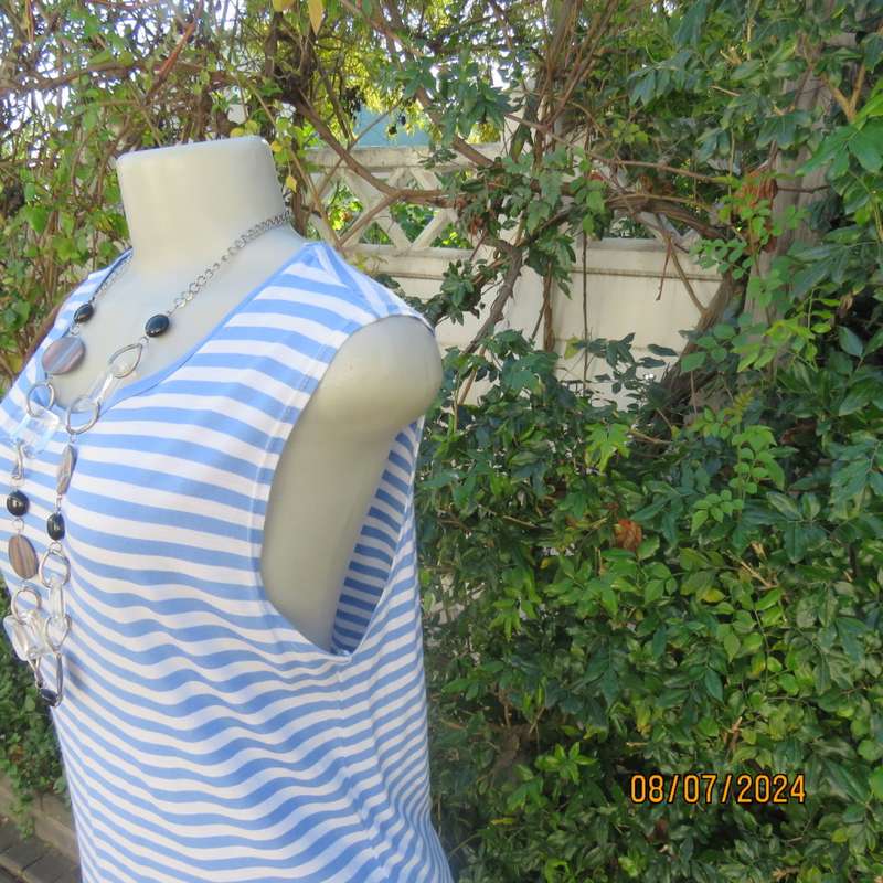 Cool sleeveless horizontal striped blue/white longer length poly/viscose top. Size 36. Good cond.