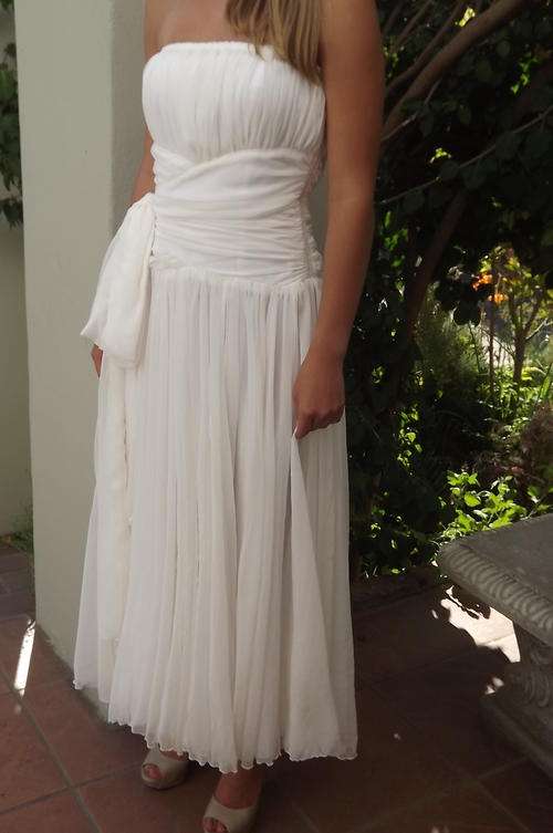 White strapless chiffon dress in size32/34.