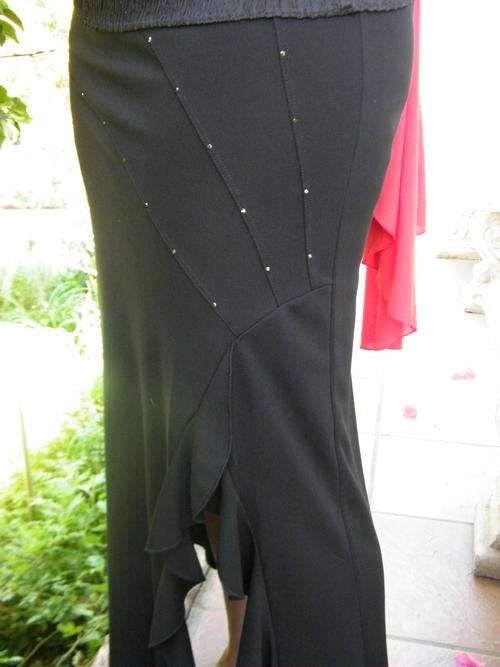 Janine 100% Polyester Black Full Length Skirt with frilled slit