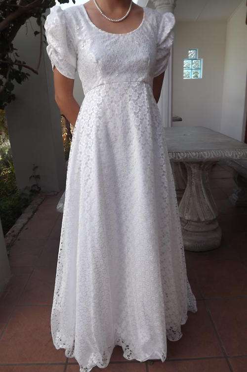 Long White Lace Dress - double lining and short gathered sleeves - accessorize to suit the occasion