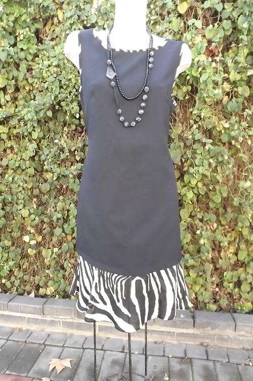 Black Dress with Animal Print Frill Seam in size 14/38 - 100% Polyester wash & wear