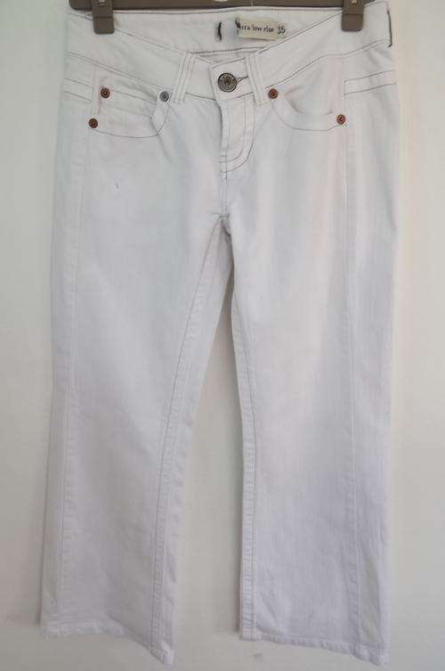 White Stretch Ultra Low Rise Jeans with Back Pockets in size 11/35 - stud decoration-very good cond