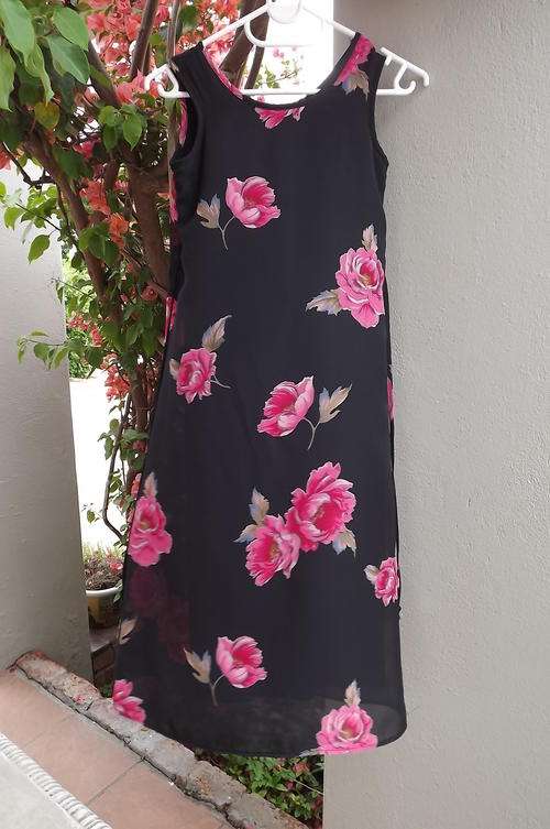 Black Lined Dress with Bold Pink Flowers for that special occasion - will fit 7-8 year old - as new