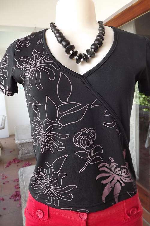 Black Stretch Polyester Top with Lavender Colour Floral Print on one side of Front in size 10/34