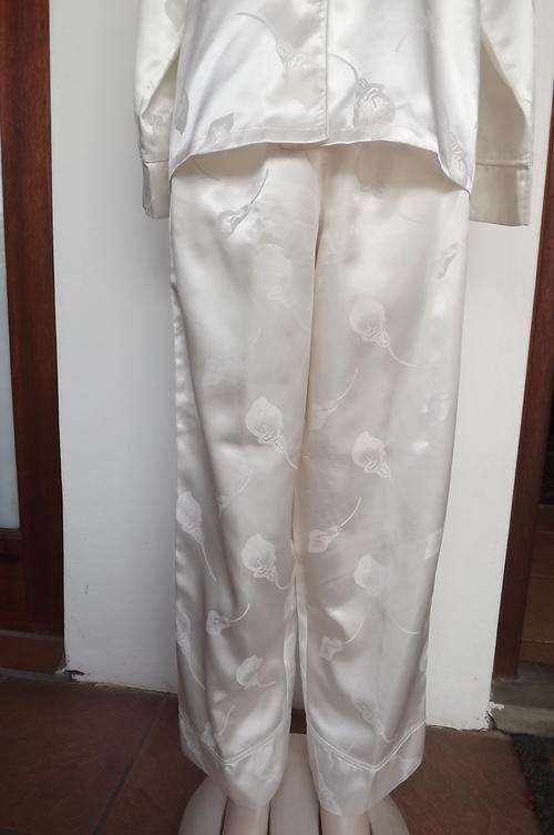 Sleepwear Lady s Cream Silky Pyjamas with Lily Design Covered Buttons in size M by Foschini will fit 36 38 was sold for 75.00 on 13 Dec at 10 16 by trendyvintage191 in Oudtshoorn ID 124715623