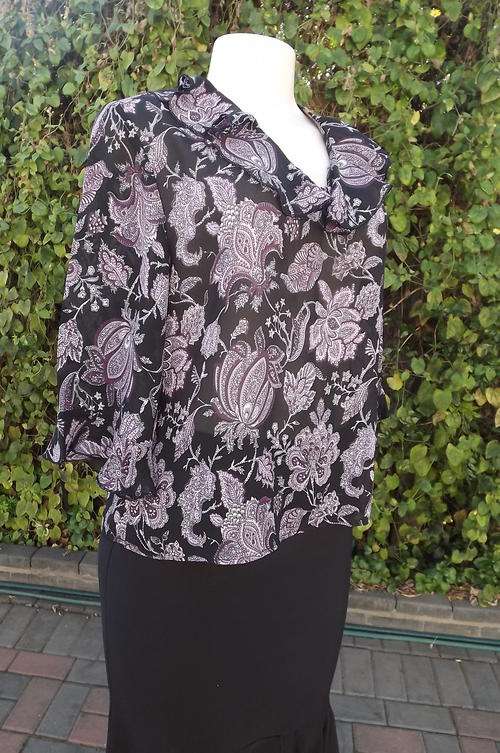 Black cropped Polyester Top with Purple Pattern  size 10/34 by Innuendo - frilled neck and cuffs .