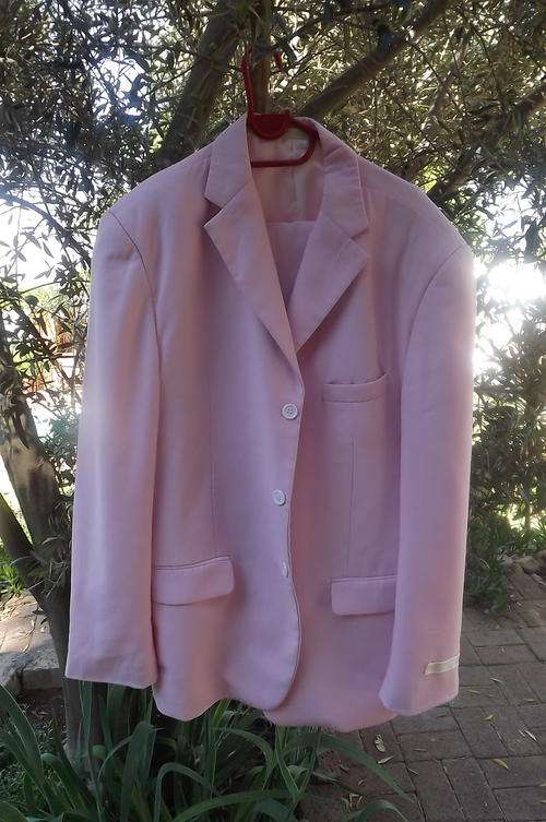 Beautiful Gentlemanly Cut Carnation Pink 2 Piece Men's Suit - pants in size 34 and jacket in size 42