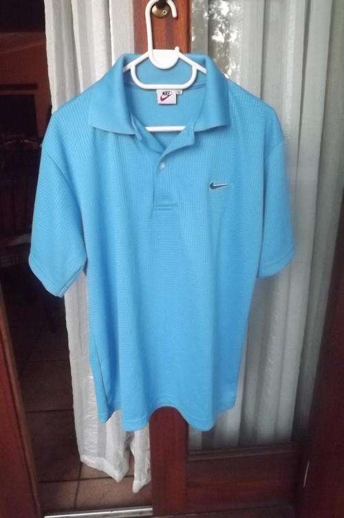 Sky Blue Men's Nike Golf Shirt in 100% Stretch Cotton in size Medium - as new condition