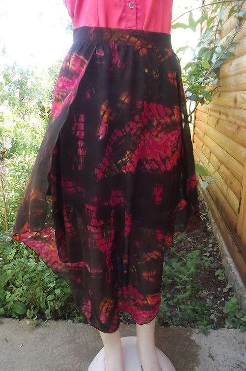 Black Sheer Skirt in 3 Overlays with Lining in size 16/40 by Network - used but in good condition