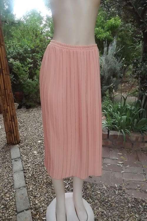 Peach Colour Long Skirt in Narrow Permanent Pleats by Rene Taylor Milady's in size 18/42 - as new