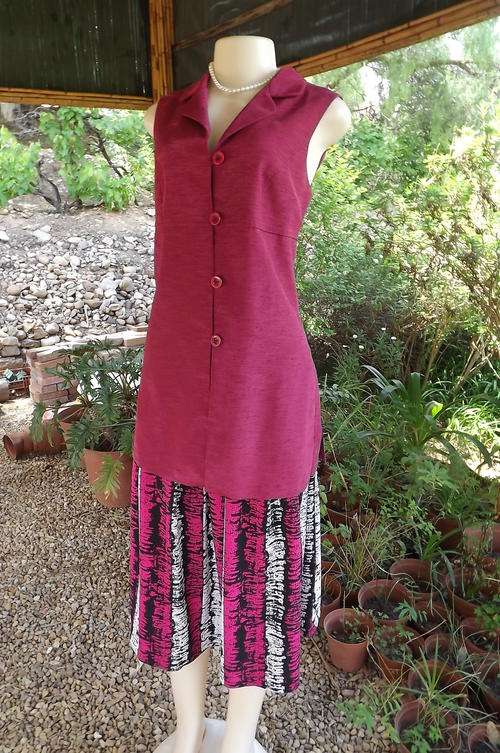 Long Cerise Pink Sleeveless Jacket with satin Look by Foschini in size 12/36 - new condition
