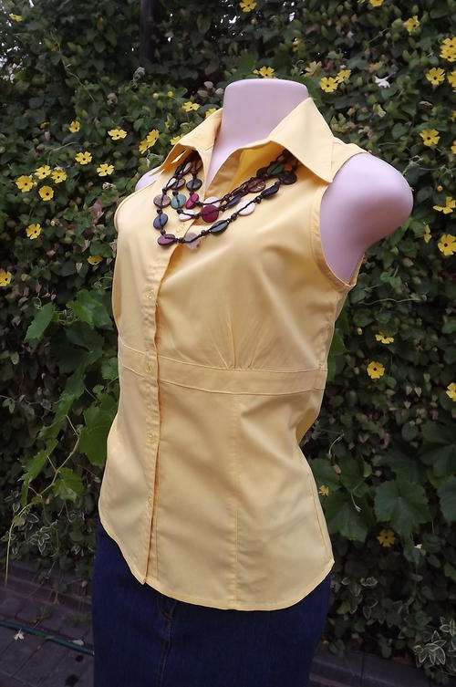 Buttercup Yellow Sleeveless Blouse by Legit in size 12/36 - very pretty and in good condition