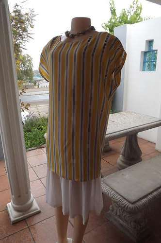 Vintage dress in size 42/18.Top layer in yellow,white & black vertical stripes.Good condition