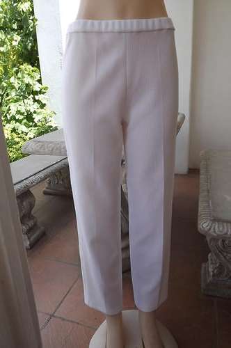Vintage polyester white ribbed pants with elasticated middle.Size 36/12.Still in very good condition