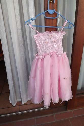 Pink satin dress with chiffon skirt overlay and netting.Frills.For 5-6 year old girl.As new conditio