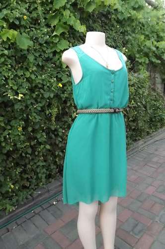 Turquose dress by Legit.Size 34/10.Polyester chiffon with lining.Dress longer at back.Good condition