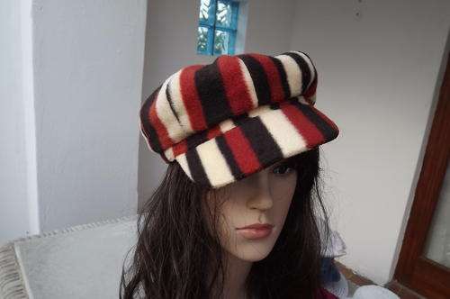 Brown & Beige Fleecy Cap in good condition - will compliment your winter outfit