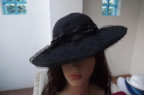 Black Vintage Hat with Netting and Flower Decor at front - bow at the back - in good condition