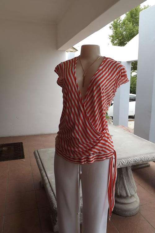 Cotton stretch fabric t-shirt.White&Orange stripe cross over top in size 40/16 by News.Good used con