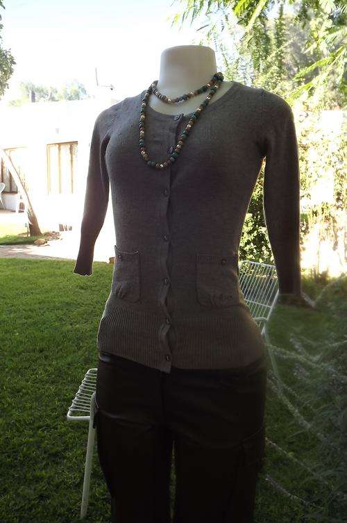 Sweet light brown knitted cardigan in 85% acrylic 15% poly.By Inwear in size XS-30/6.As new conditio
