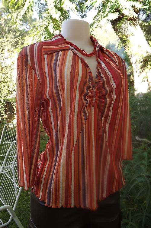 Cheerful autumn colour top with vertical stripes by News Casuals.Size 36/12.3Quarter loose sleeves.