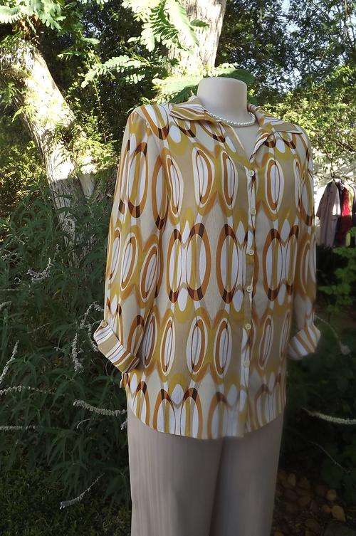 Long sleeve sheer Miladys blouse.Size 36/12.Corded button down front with collar in Geomatric design