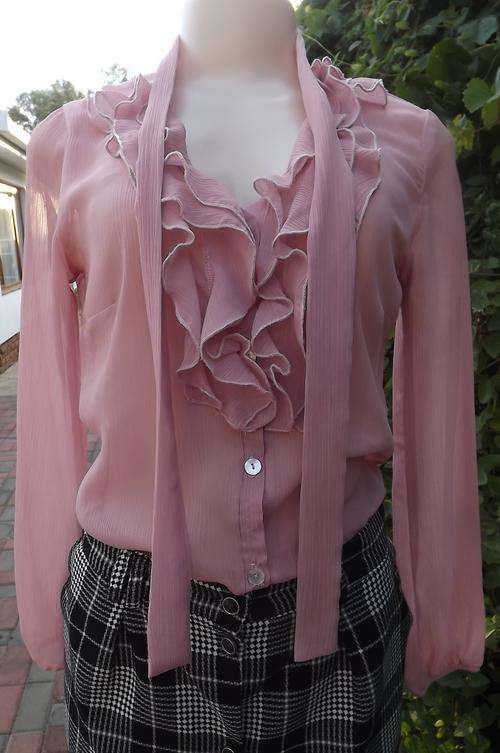 Dirty pink sheer long sleeve vintage foshini blouse.Size 32/8.Frilled neckline and tied neckline.