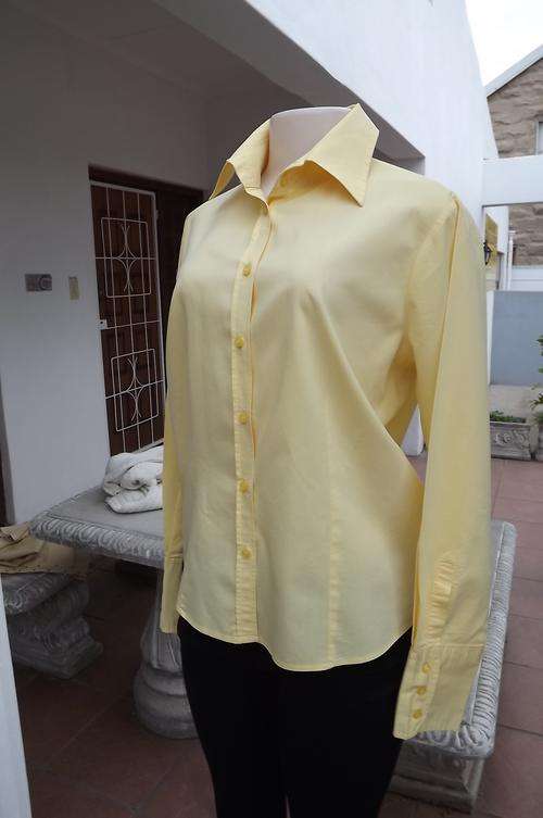 Beautiful tailored buttercup colour Woolworths ladies shirt.Size 38/14.Button down front.Wide cuffs.