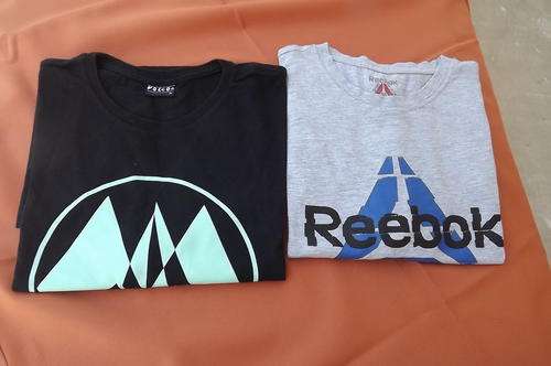 Set of 2 Medium size T shirts.1 x Black Volcom and 1 x Reebok.Used but in good condition