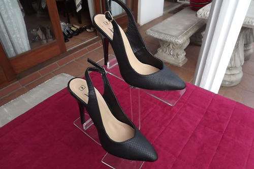 Pair of black stiletto heel sandals by Jet stores.Used once.As new.Size 4